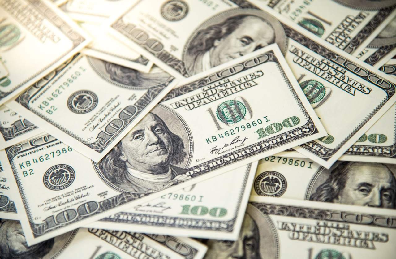 Dollar treads water as markets await news on Trump's health