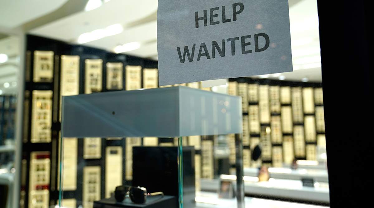 U.S. weekly jobless claims fall; consumer spending declines in November