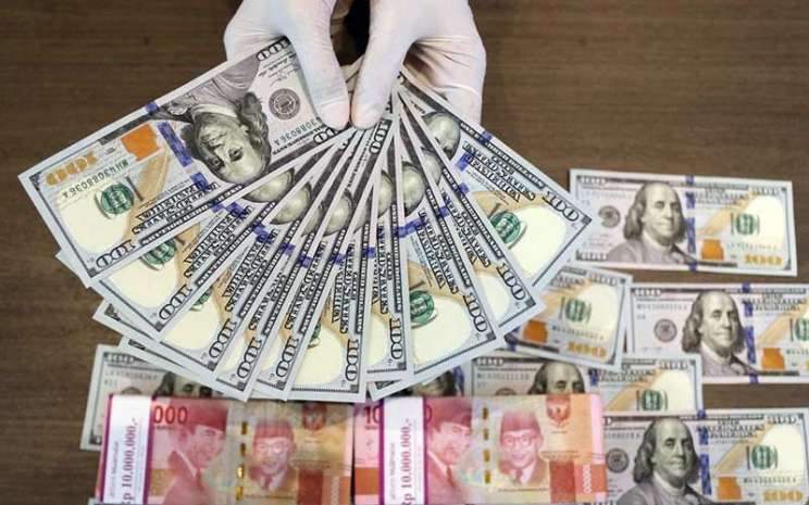 The Fed Tak Berikan Kejelasan Waktu Tapering, Dolar AS Tergelincir