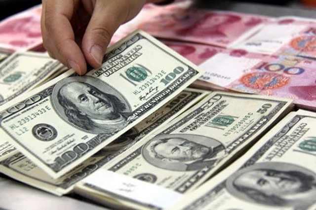 Nhân dân tệ có thể rớt giá so với USD vào năm 2022