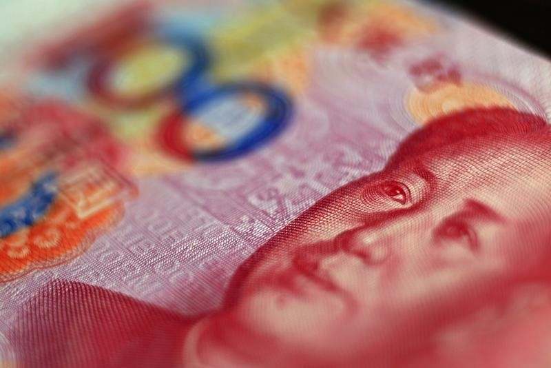 Nhân dân tệ của Trung Quốc giảm xuống gần mức 7 sau khi PBOC cắt giảm tỷ giá