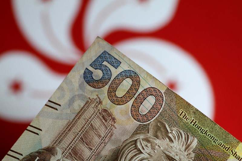 Traders Skeptical That Trump Will Break Hong Kong’s Dollar Peg