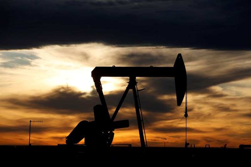 Oil rises after surprise drop in U.S. inventories offsets demand concerns