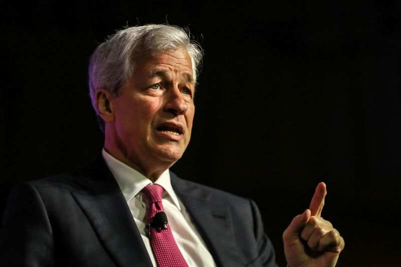 JPMorgan CEO Dimon Sees Higher Expenses, Hunts Asset-Management Businesses