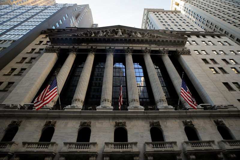 Wall Street Ends Lower on Stimulus Uncertainty, Facebook Weighs