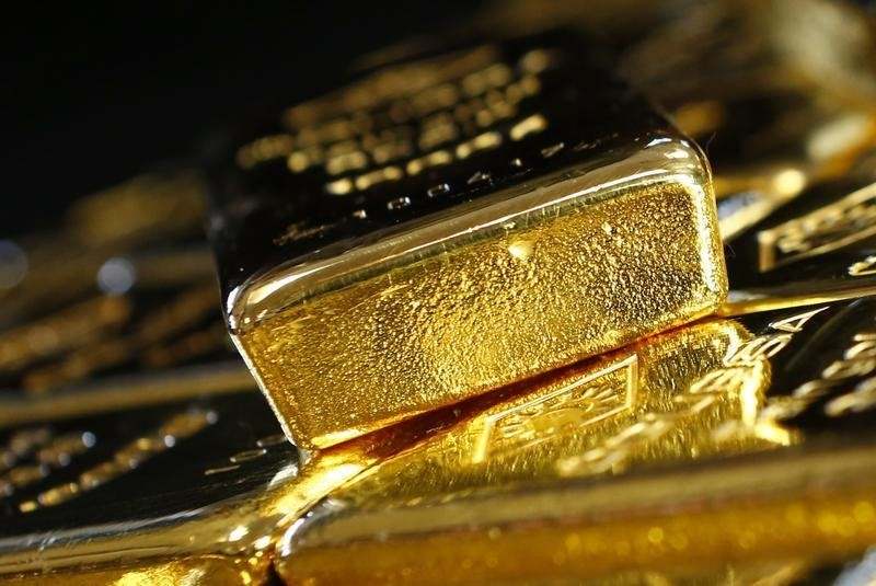 Vàng tăng giá nhưng đà tăng bị hạn chế bởi lợi suất trái phiếu tăng cao