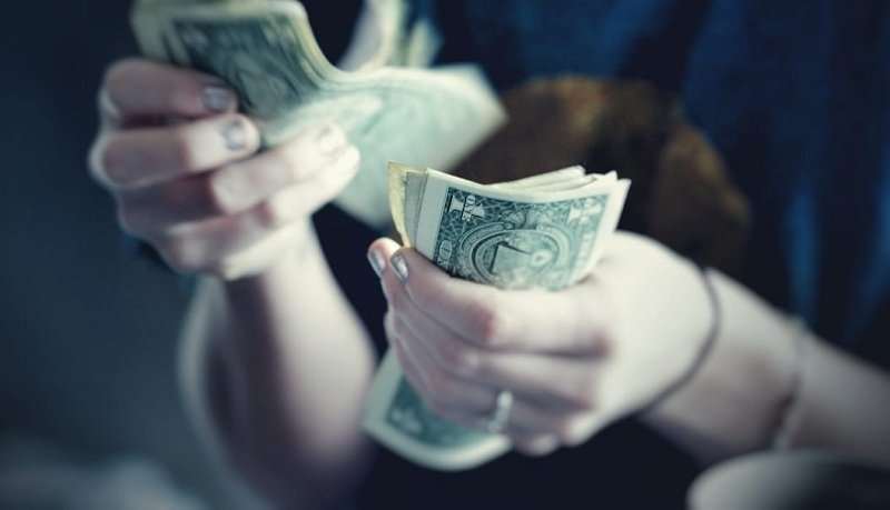 Dolar AS Melemah Sikapi Kebijakan Bank Sentral Kanada