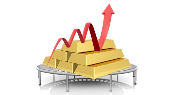 Harga Emas Dunia Melompat ke Posisi Tertinggi dalam Sebulan
