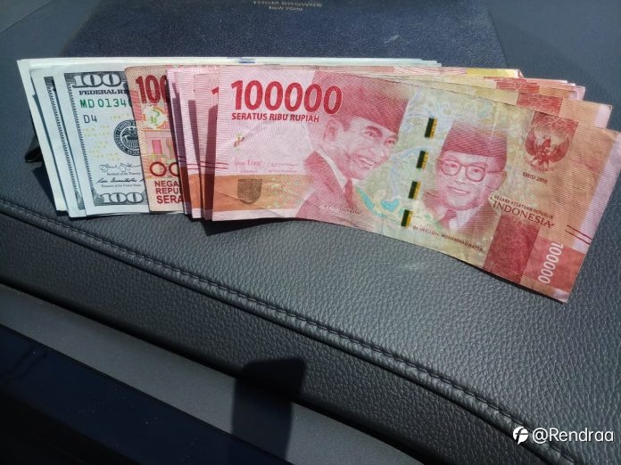 Rupiah Selasa Siang Menguat ke Rp14.391/USD; Dollar di Asia Bertahan, Koreksi Prospek Penundaan Tapering