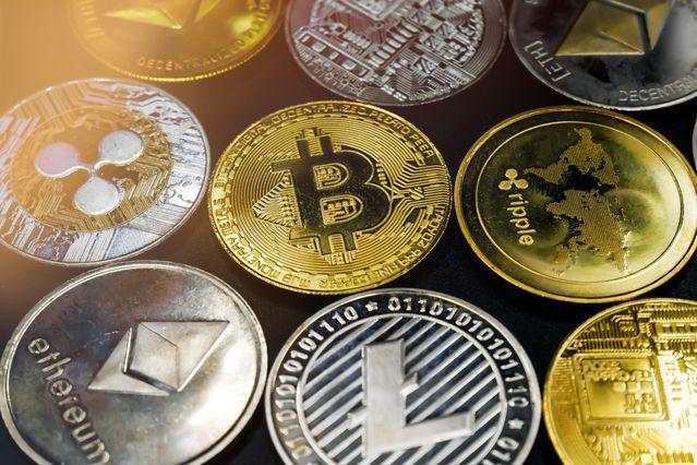 Bitcoin Fights for $20,000 as Cryptos Follow Slide in Stocks