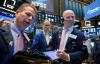 Wall Street Tak Kompak Sambut Data Inflasi dan Debat Capres AS
