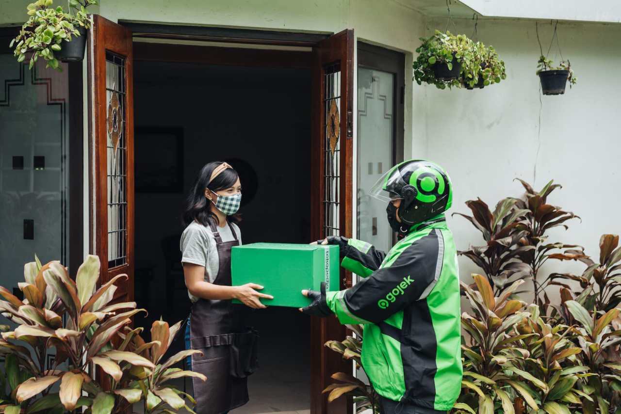 Saham GOTO Naik di Tengah Rumor Merger dengan Grab