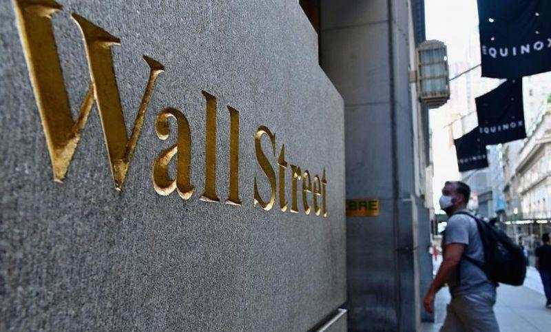 Wall Street Beragam, Indeks Dow Jones Naik Sendirian Berkat Laporan Keuangan