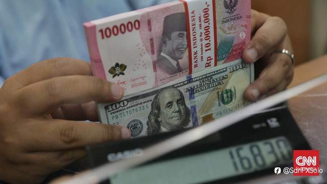 Rupiah Dibuka Melemah ke Rp16.703 per Dolar AS